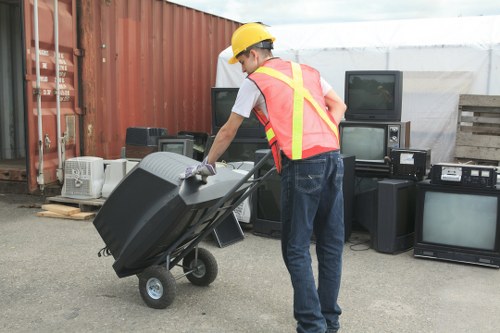 Crew loading furniture from a Bayswater flat